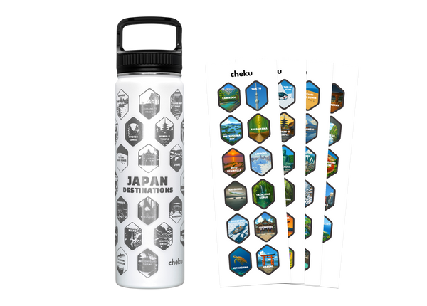 White water bottle with black lid and 'Japan Destinations' design, next to a sheet of colorful hexagonal stickers on a white background.